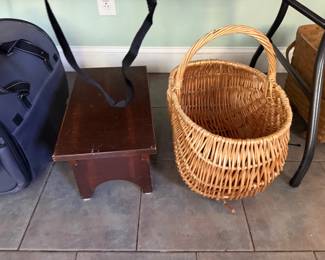 Wooden step stool and a large wicker gathering basket