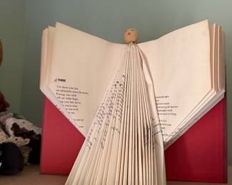 Folded book page angel sculpture