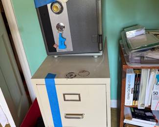 Brinks combination safe and a two drawer metal filing cabinet