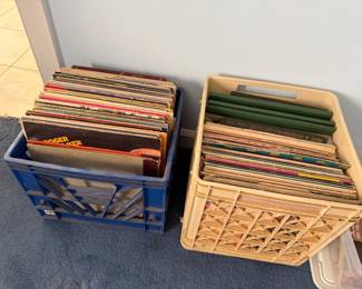 Two milk crates full of vinyl LP records