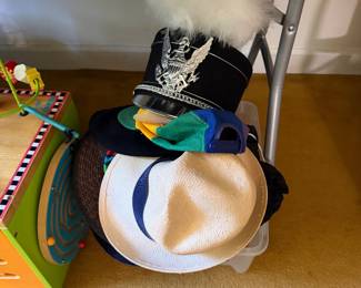Marching band shako hat with plume and crest, with straw hats and caps