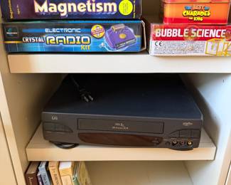 Science kits including Magnetism, Electronic Crystal Radio and Bubble Science, Charades game, VCR and books