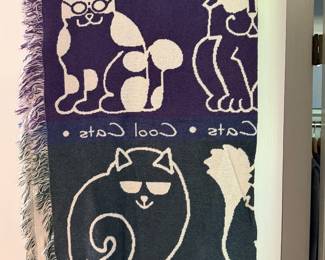Woven fringed throw blanket with a Cool Cats design