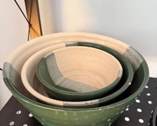 Nested set of green and cream stoneware mixing bowls