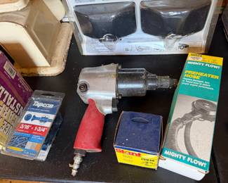 Pneumatic impact wrench with Tapcon concrete anchors, a Stant thermostat and a preheater hose