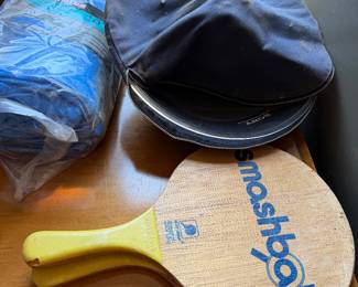Smashball paddle, a Sony soft case and a packaged tarp