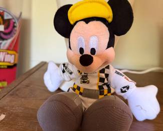 Mickey Mouse plush in a racing outfit