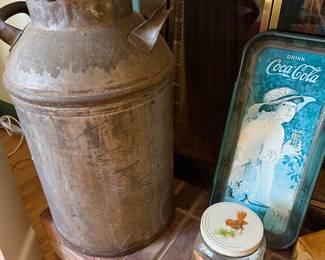 Galvanized milk can with lid, blue Coca-Cola serving tray and a glass jar with rooster lid