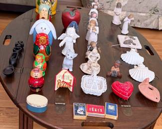 Russian nesting dolls, angel figurines, porcelain shell dishes and trinket boxes