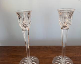 Pair of cut crystal candlesticks with star cut bases