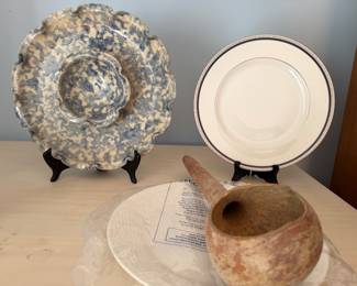 Blue spongeware chip and dip plate, navy banded dinner plate and a stoneware pouring vessel