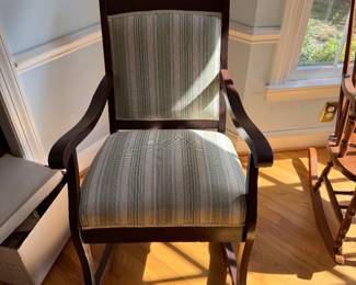 Dark wood armchair with striped upholstered seat and back