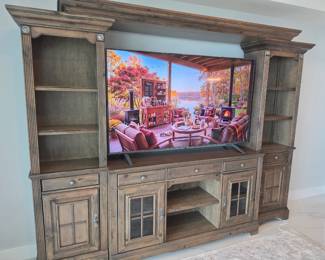 This entertainment center has four pieces