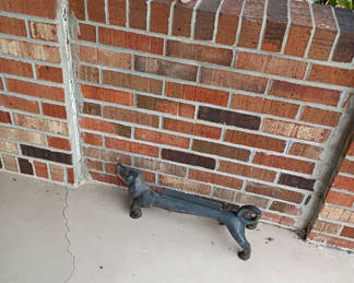 Lot 804: Cast Iron Dachshund Boot Scraper and Assorted Stones