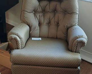 Lot 101: Tufted Swivel Rocking Armchair