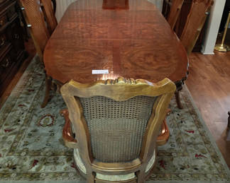 Lot 1: Wood Dining Table and Six Cane-Back Chairs