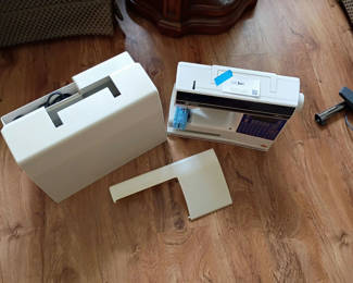 Lot 301: Husqvarna Viking Rose Sewing Machine with Case and Manual