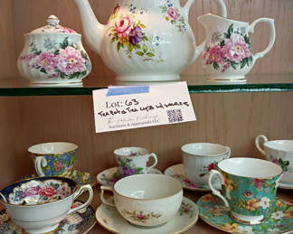 Lot 63: Floral Porcelain Tea Set and Assorted Teacups with Saucers