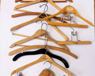 Lot 23: 12 Vintage Wooden Hangers with Advertising