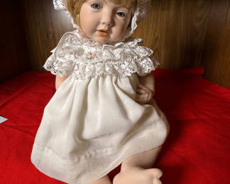 Lot 88: Porcelain Baby Doll in White Lace Dress