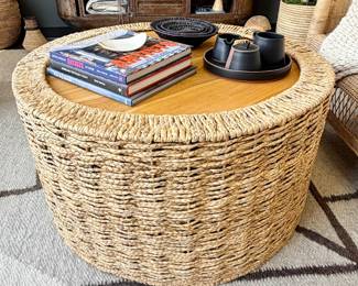 Round woven coffee table with wood top