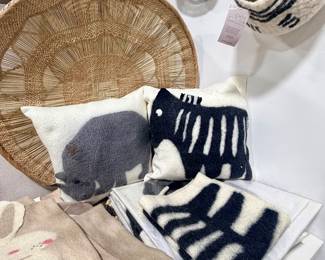 Felted wool rhino and zebra pillow covers