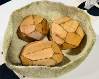 Multi faceted wood carved decor