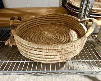 Woven basket with handles
