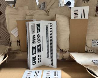 Huge assortment of hand woven totem wall hangings