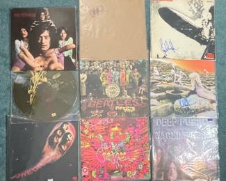 Collection of Vintage Rock Vinyl Records with Autographs