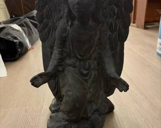 266 castkneelingangelstatueinthemanner