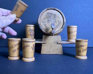 305 smallcarvedwoodenbarrelwithsixsmal