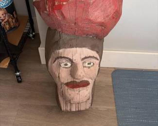 016 folkartcarvedwoodheadwithredhata