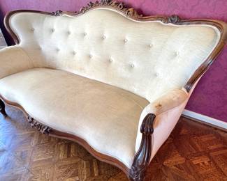 French Louis XV Style Carved Walnut Tufted Settee with Floral Crest