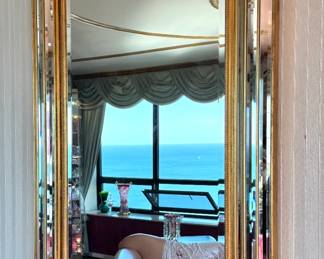 Hollywood Regency Beveled Venetian-Style Wall Mirror with Gilt Floral Corner Mounts
