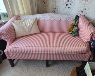 Pink & White Striped Camelback Loveseat with Rolled Arms & Mahogany Legs