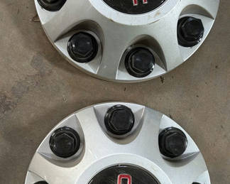 Lot 49: GMC Wheel Center Caps and Lug Nuts