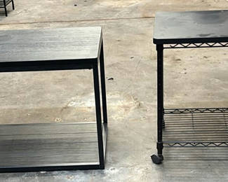 Lot 131: Two Black Side Tables
