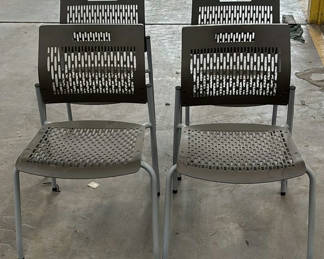 Lot 117: Set of Four Stackable Chairs