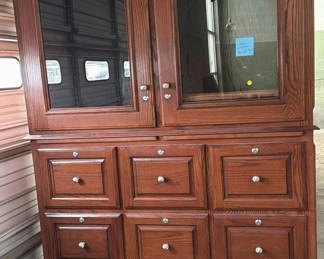 Lot 8: Wood Storage Cabinet With Glass Doors and Multiple Drawers