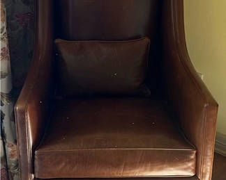 Lot 17: Brown Leather Wingback Armchair with Pillow