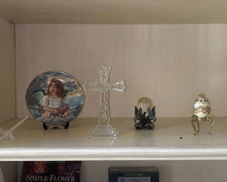 Lot 110: Decorative Figurines, Collector Plate, Crystal Cross, and Photo Frames