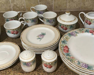 Lot 305: Fruit Pattern Dinnerware Set with Plates, Bowls, Mugs, Creamer, Sugar Bowl, and Shakers
