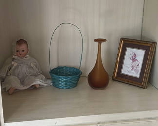 Lot 109: Porcelain Doll, Woven Basket, Vase, and Framed Angel Print