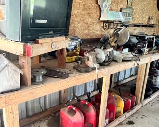 LONG BENCH LAODED WITH TOOLS