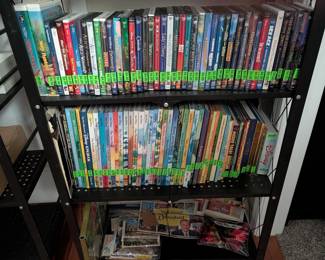 Collection of Disney books and videos