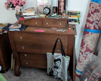 Dresser covered with Elvis memorabilia 