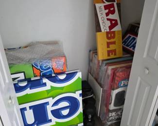 Closet of large pop art-style candy wrapper canvases and framed art