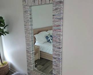 Tall rectangular mirror with textured multicolor strip frame