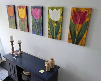 Set of five painted tulip panels with navy console and candlesticks